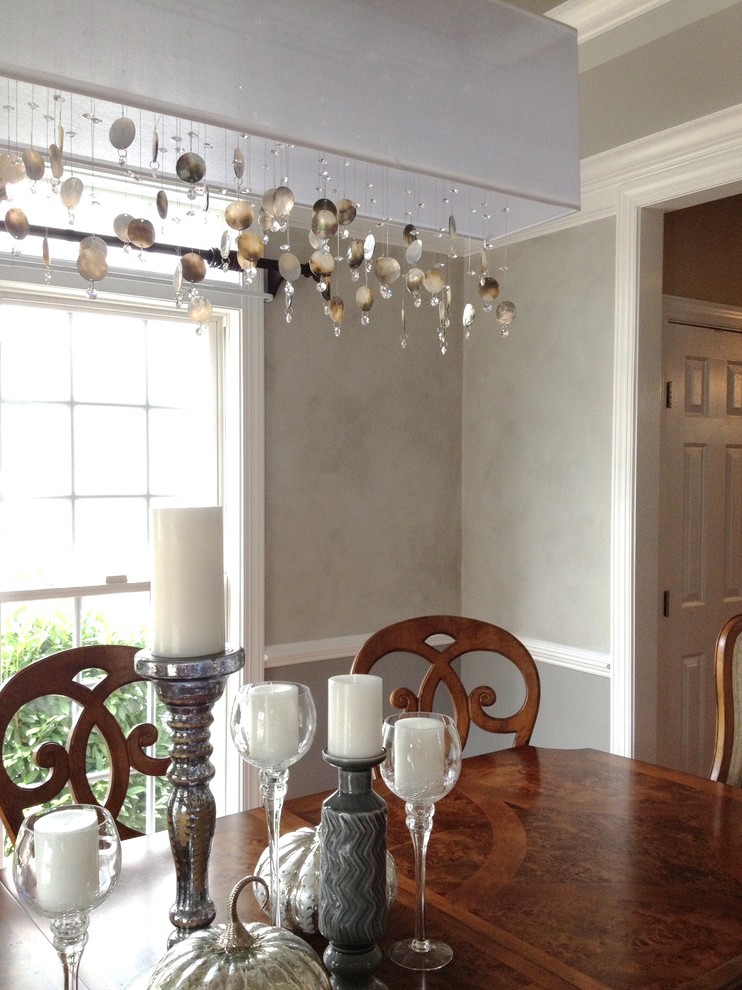 Enclosed dining room - mid-sized transitional enclosed dining room idea in DC Metro with gray walls