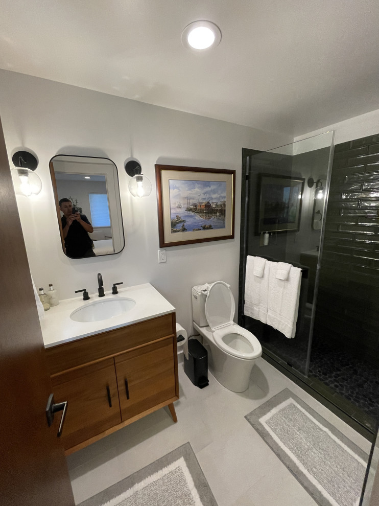 Modern Bathroom Transformation with Custom Tile Shower.