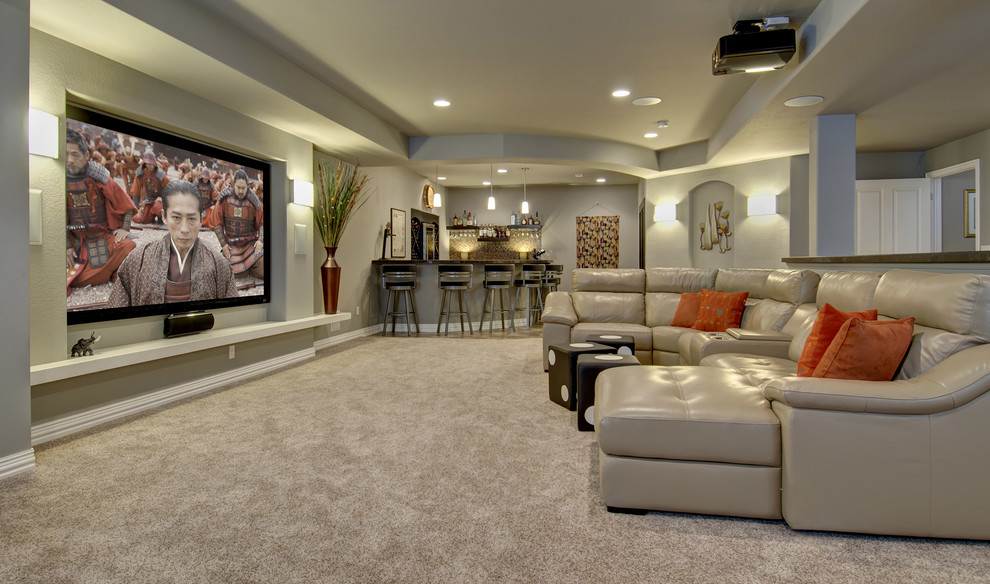 This is an example of a mid-sized transitional look-out basement in Denver with grey walls, carpet, no fireplace and beige floor.