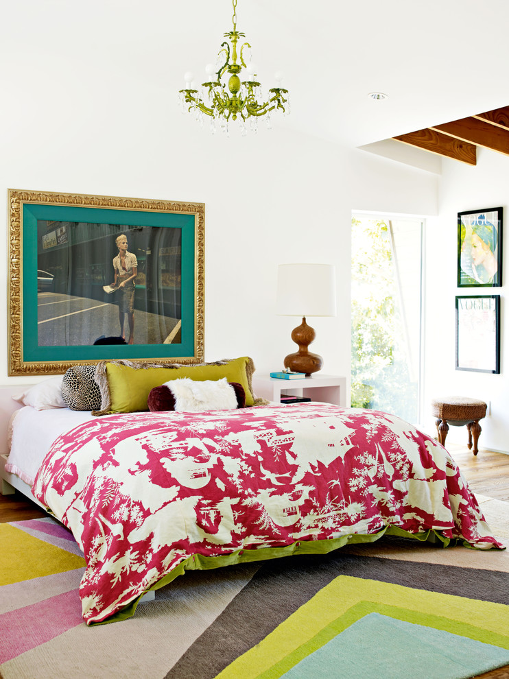 Inspiration for an eclectic bedroom in Other with white walls.