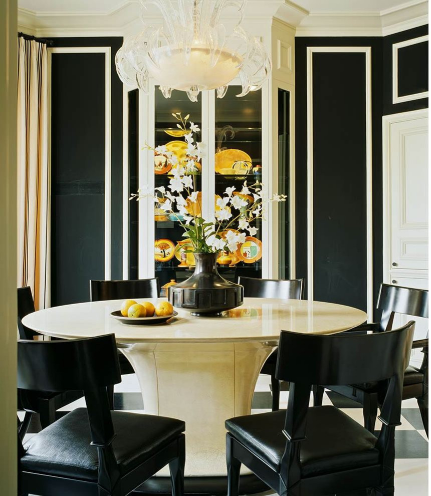This is an example of a mid-sized mediterranean separate dining room in San Francisco with black walls, porcelain floors, no fireplace and multi-coloured floor.
