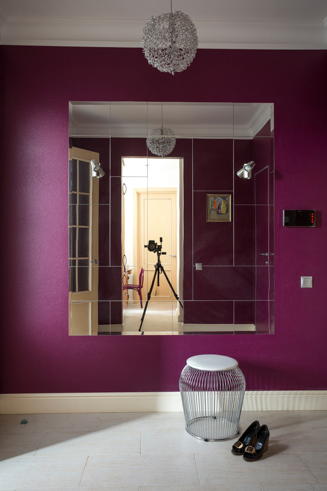This is an example of a small transitional foyer in Moscow with purple walls, porcelain floors, a single front door, a light wood front door, white floor and wallpaper.