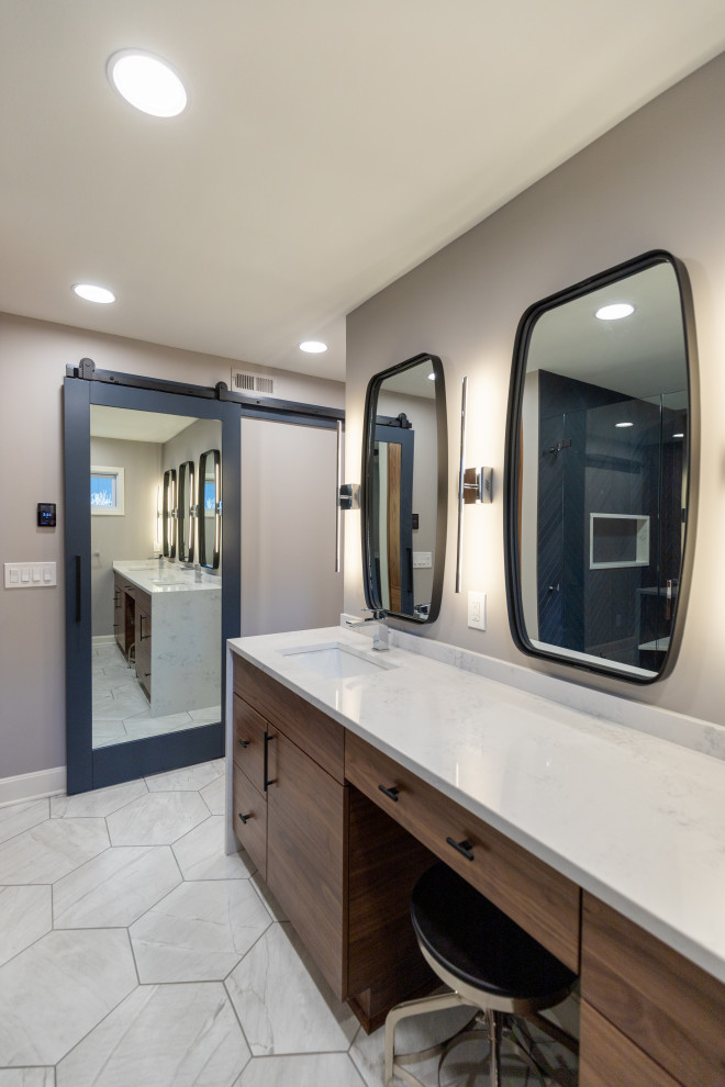 Inspiration for a large modern master bathroom in Kansas City with flat-panel cabinets, medium wood cabinets, an alcove shower, a two-piece toilet, beige walls, porcelain floors, an undermount sink, engineered quartz benchtops, grey floor, a hinged shower door, grey benchtops, a niche, a double vanity and a built-in vanity.
