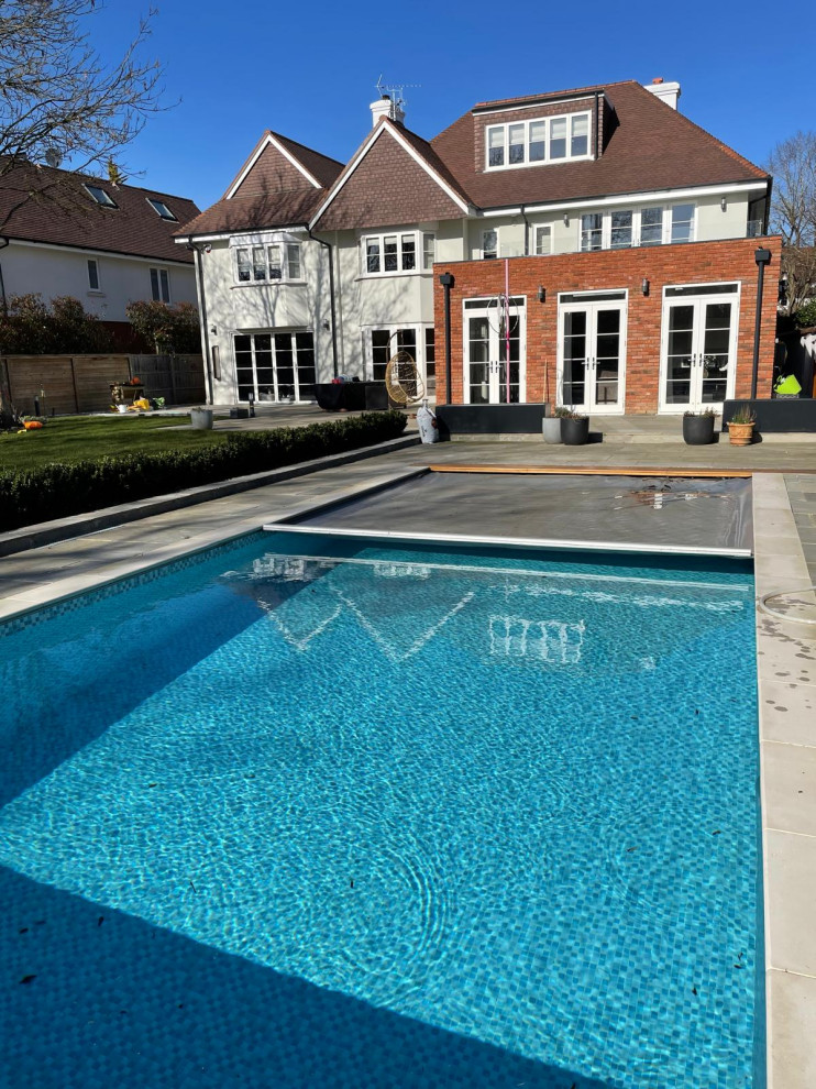 Double storey side and single rear extensions, full roof reconfiguration