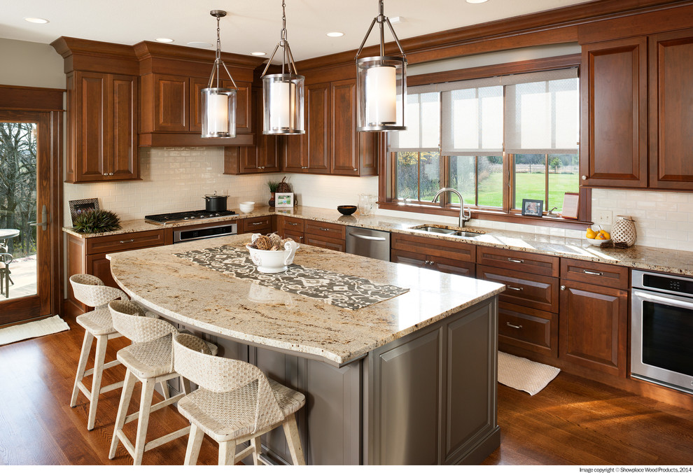 Open concept kitchen - transitional u-shaped medium tone wood floor open concept kitchen idea with a double-bowl sink, raised-panel cabinets, dark wood cabinets, granite countertops, white backsplash, stainless steel appliances and an island