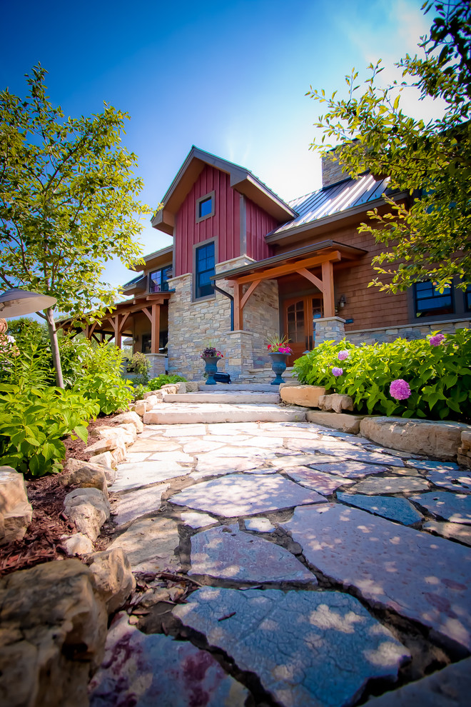 Traditional exterior in Minneapolis with stone veneer.