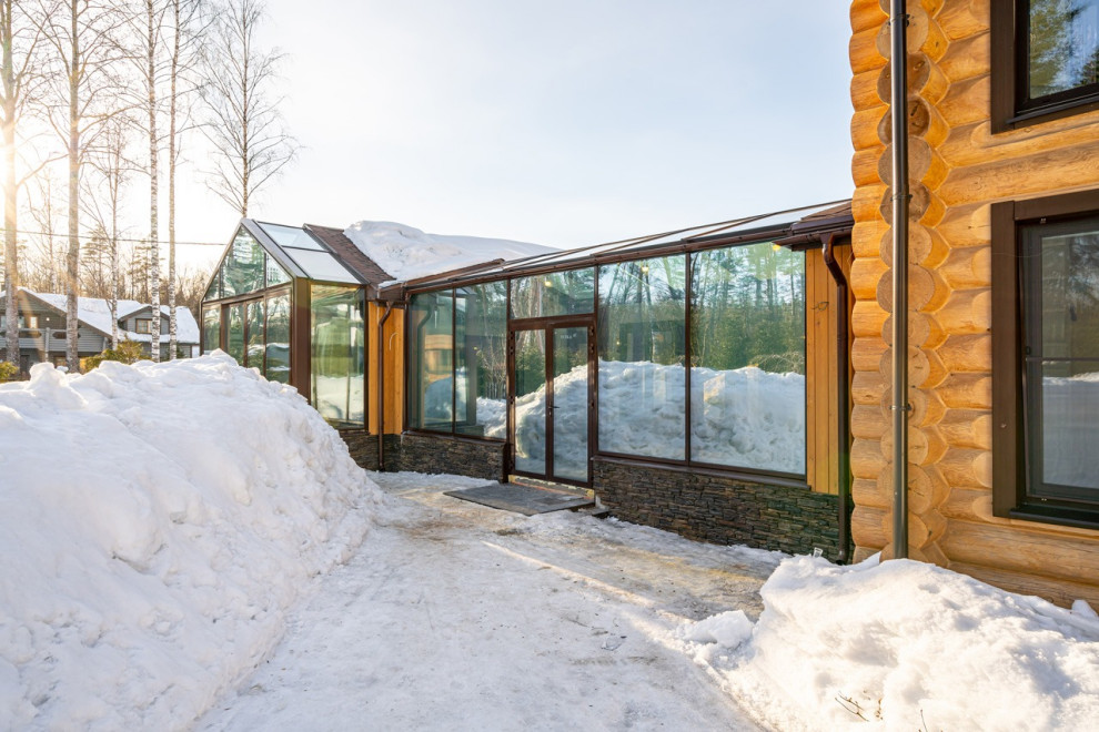 Строительство загородного дома с зимним садом с электрохромными стеклами перемен