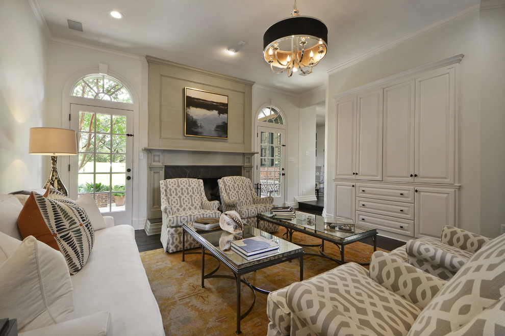 Example of a mid-sized classic formal and enclosed dark wood floor living room design in Austin with white walls, a standard fireplace and a tile fireplace