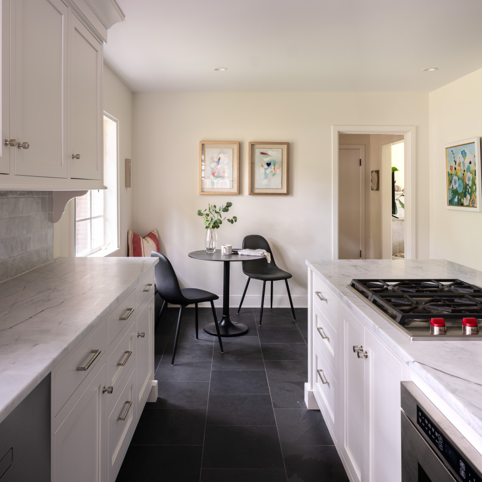 Eat-in kitchen - mid-sized transitional l-shaped cement tile floor and gray floor eat-in kitchen idea with a drop-in sink, shaker cabinets, white cabinets, quartzite countertops, gray backsplash, porcelain backsplash, stainless steel appliances, an island and multicolored countertops