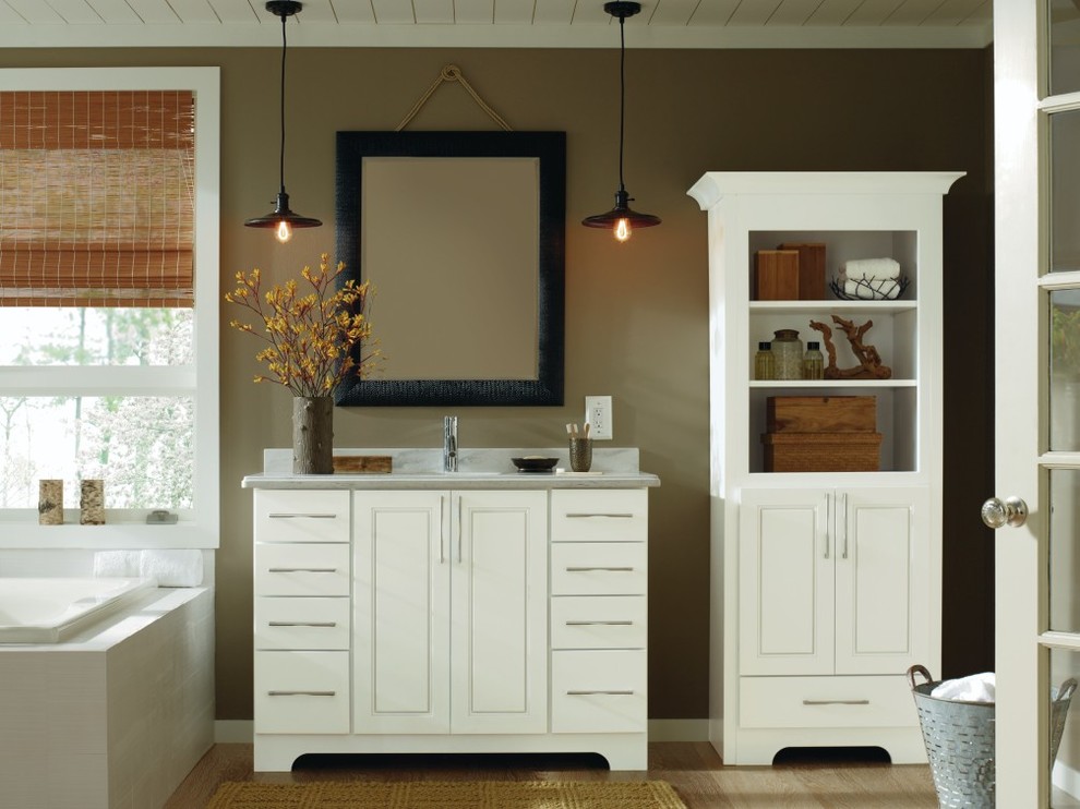 Design ideas for a mid-sized traditional master bathroom in Other with white cabinets, brown walls and light hardwood floors.