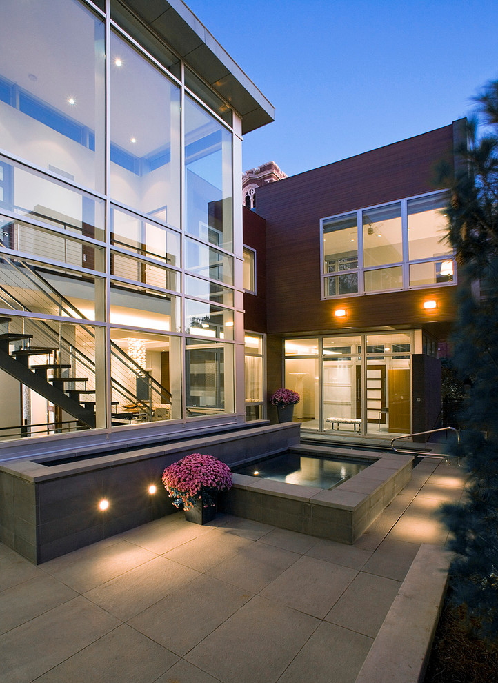 Photo of a contemporary courtyard pool in Chicago.
