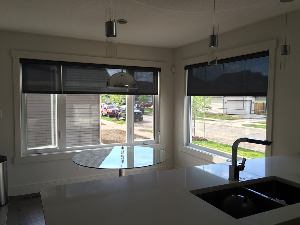 Example of a trendy kitchen design in Calgary