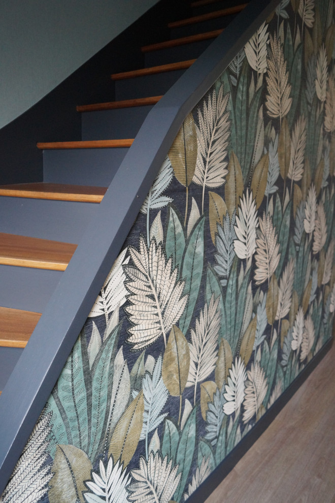Photo of an expansive tropical staircase in Rennes with wallpaper.