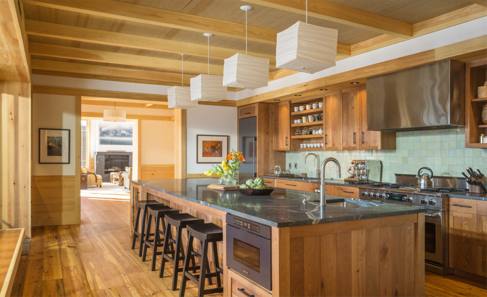 Inspiration for a country separate kitchen in Burlington with an undermount sink, medium wood cabinets, green splashback, stainless steel appliances, medium hardwood floors, with island, grey benchtop, exposed beam and wood.