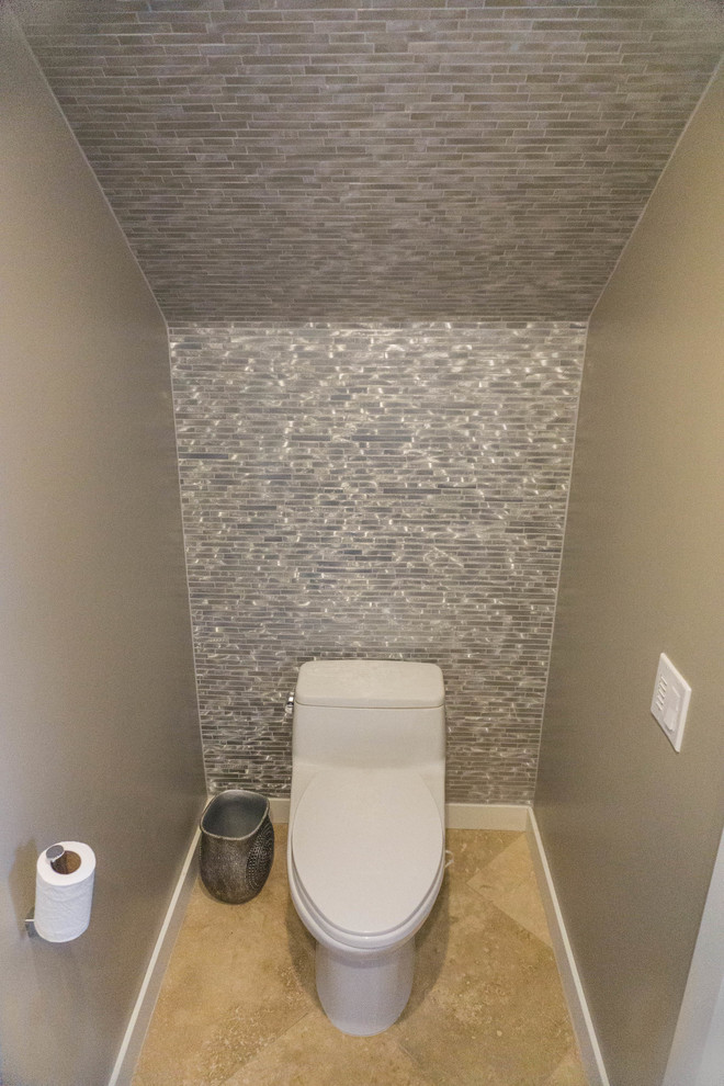 Inspiration for a small modern powder room in San Diego with a one-piece toilet, gray tile, beige walls, travertine floors, a vessel sink, granite benchtops and matchstick tile.