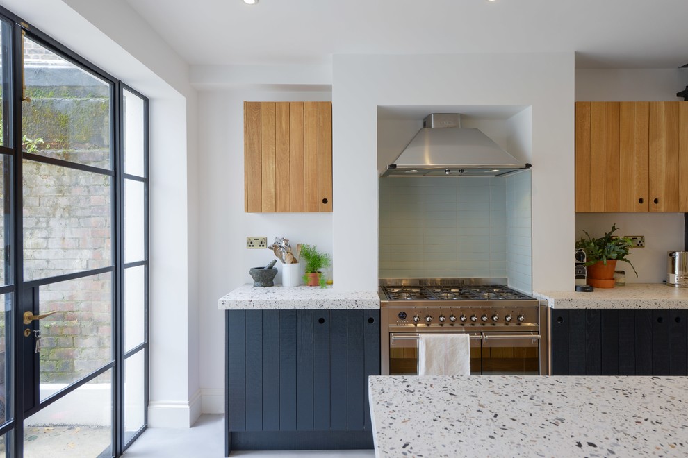 Design ideas for an industrial kitchen in London with terrazzo benchtops.