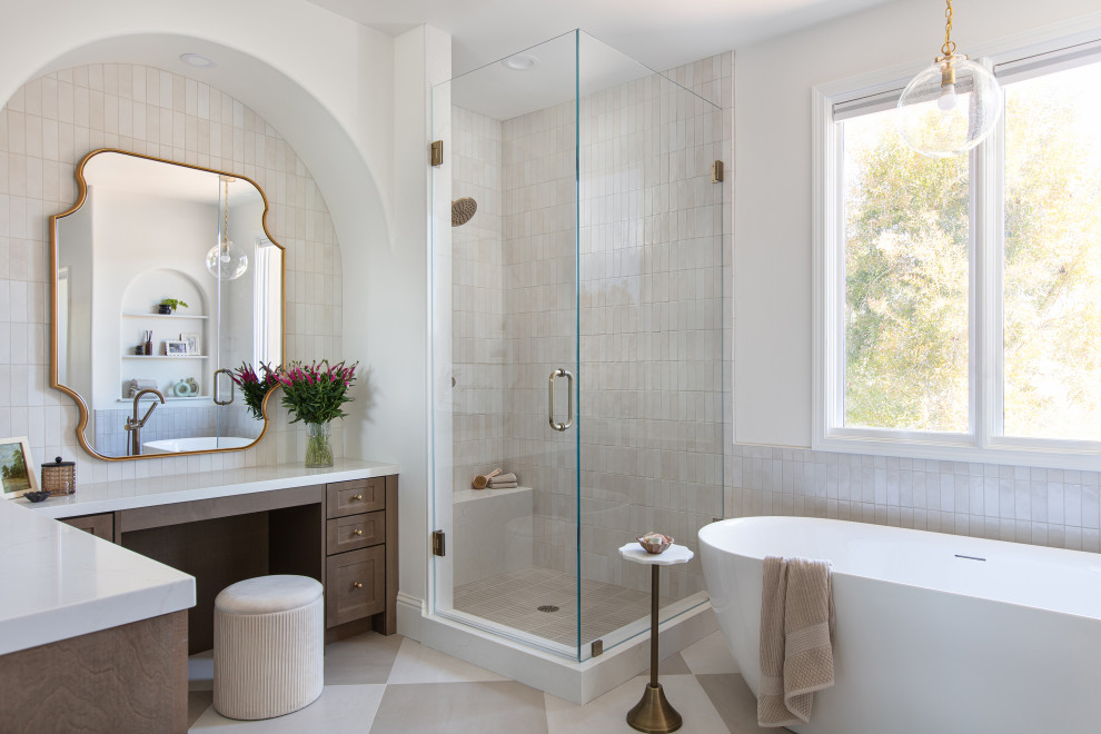 Example of a huge transitional master white tile and porcelain tile porcelain tile and single-sink freestanding bathtub design in San Diego with shaker cabinets, brown cabinets, an undermount sink, a hinged shower door, white countertops and a built-in vanity