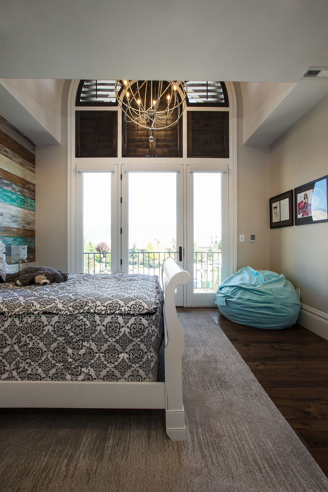 Inspiration for a mid-sized traditional bedroom in Salt Lake City with beige walls and medium hardwood floors.