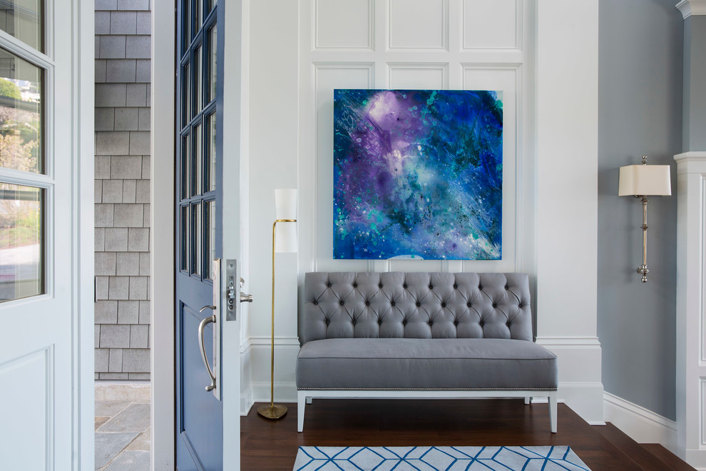 Inspiration for a large transitional medium tone wood floor and brown floor single front door remodel in Minneapolis with a blue front door and gray walls