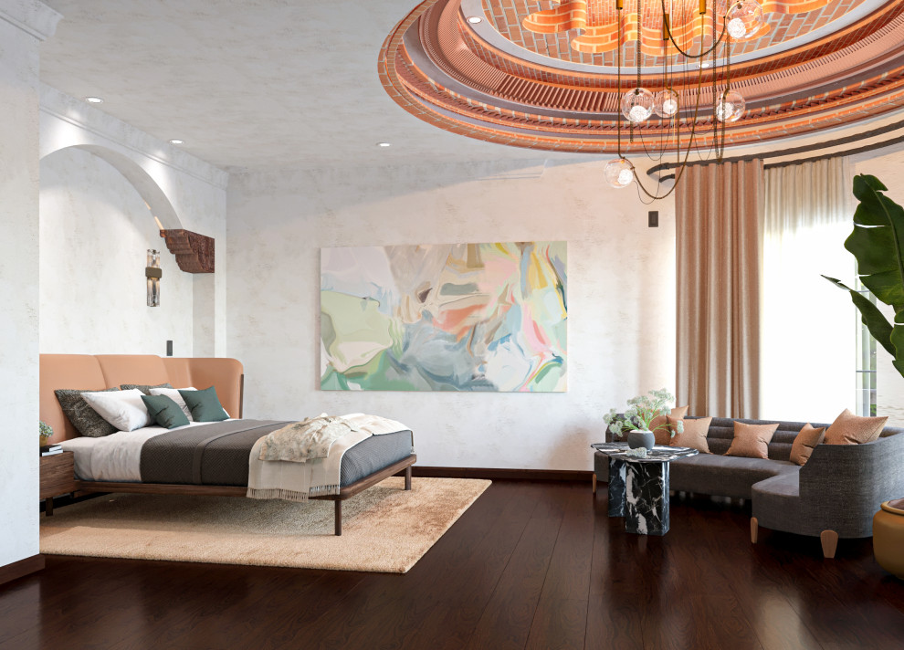 ロサンゼルスにある巨大な地中海スタイルのおしゃれな主寝室 (ベージュの壁、濃色無垢フローリング、標準型暖炉、タイルの暖炉まわり、茶色い床、三角天井) のインテリア