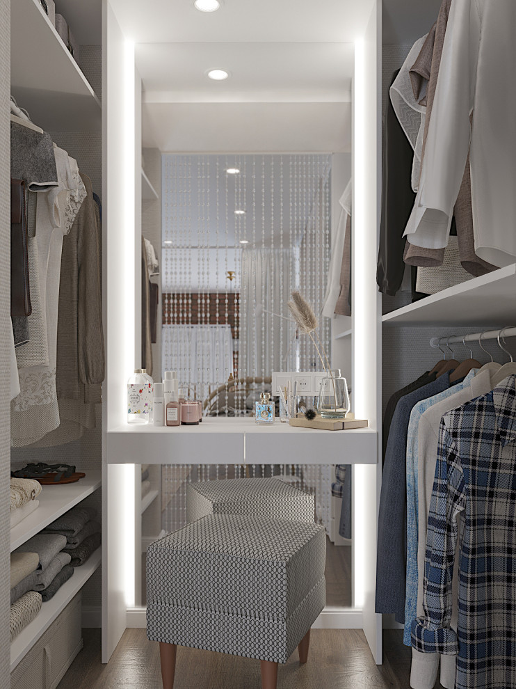 This is an example of a small retro gender neutral walk-in wardrobe in Saint Petersburg with open cabinets, white cabinets, vinyl flooring and brown floors.