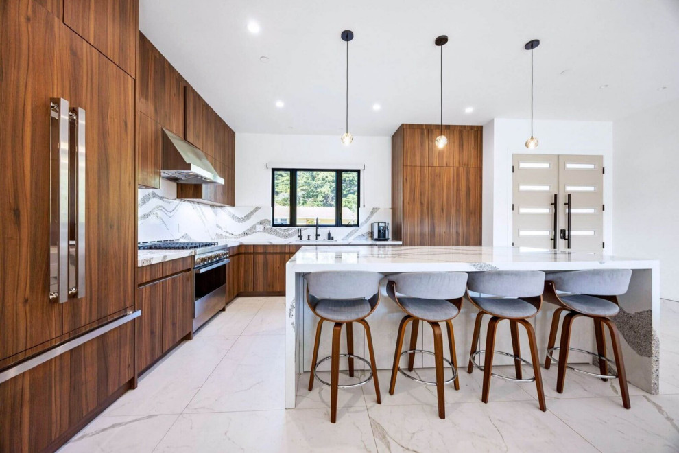 Modern Chef’s Kitchen with Wood Cabinetry and Large Island