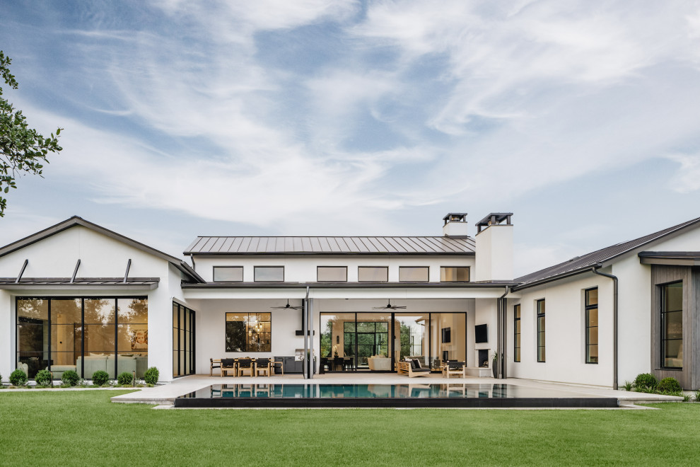 Transitional exterior home photo in Austin