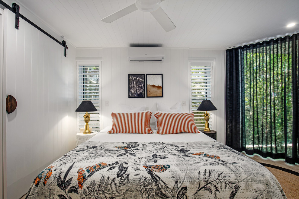 Photo of a beach style bedroom in Sunshine Coast.