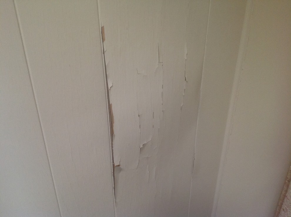 Removing/repairing buckled paneling.