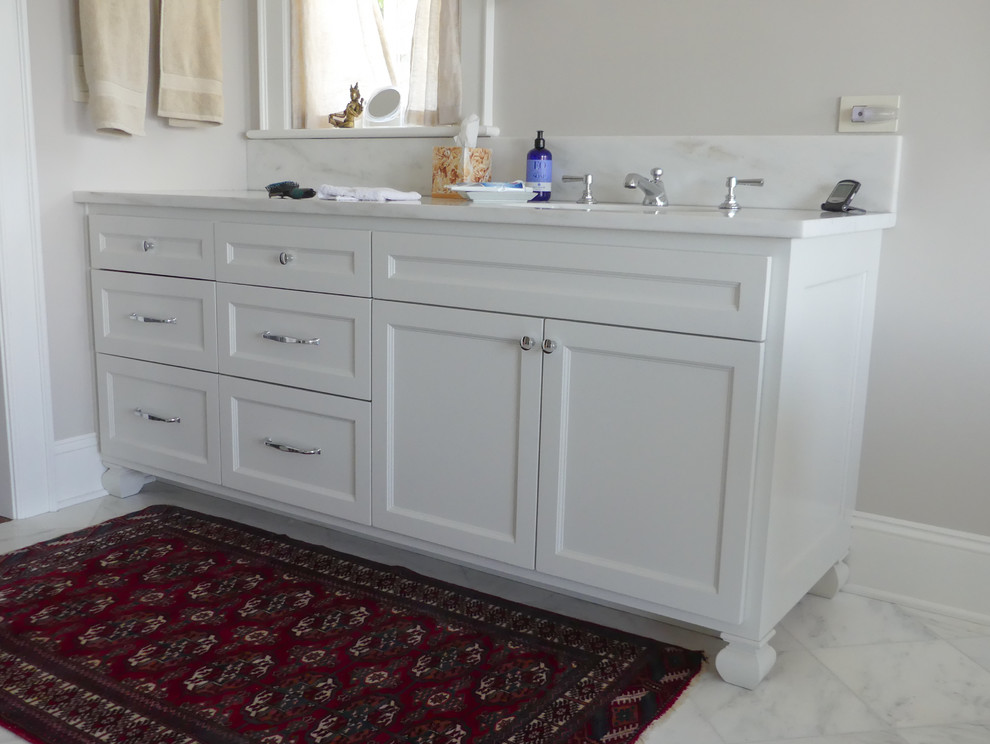 Bathroom - large traditional master bathroom idea in Burlington with recessed-panel cabinets and white cabinets