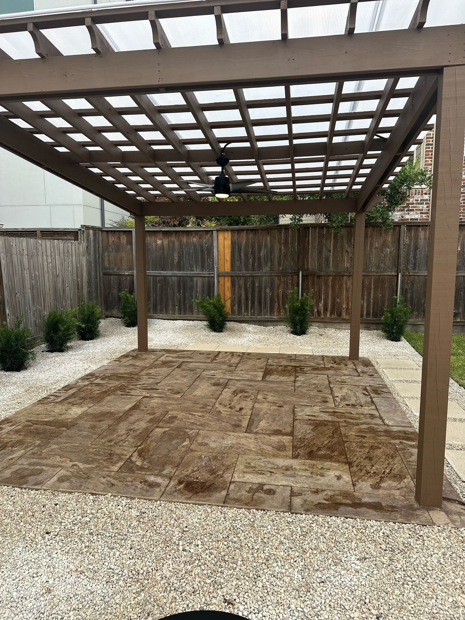 Beautiful stamped concrete patio with Pergola Cover on Haddon st!