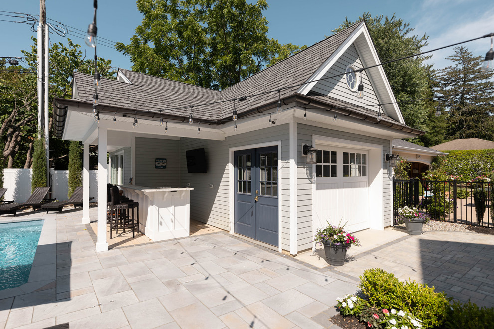 Mid-sized transitional detached one-car garage in New York.