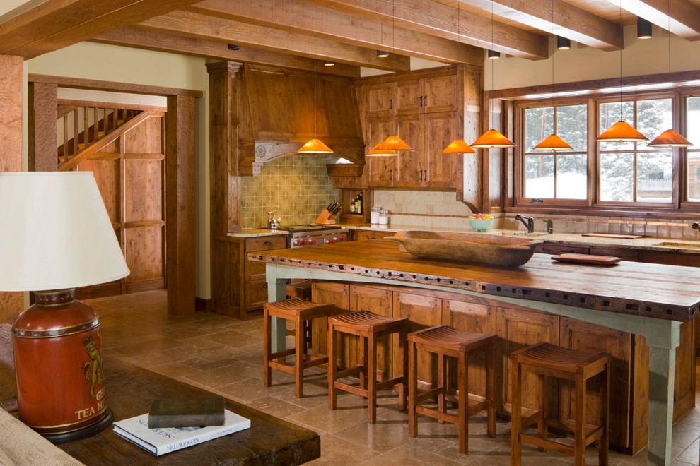 Design ideas for a large l-shaped eat-in kitchen in Albuquerque with with island, a drop-in sink, shaker cabinets, medium wood cabinets, granite benchtops, multi-coloured splashback, ceramic splashback, stainless steel appliances, ceramic floors, beige floor, multi-coloured benchtop and exposed beam.