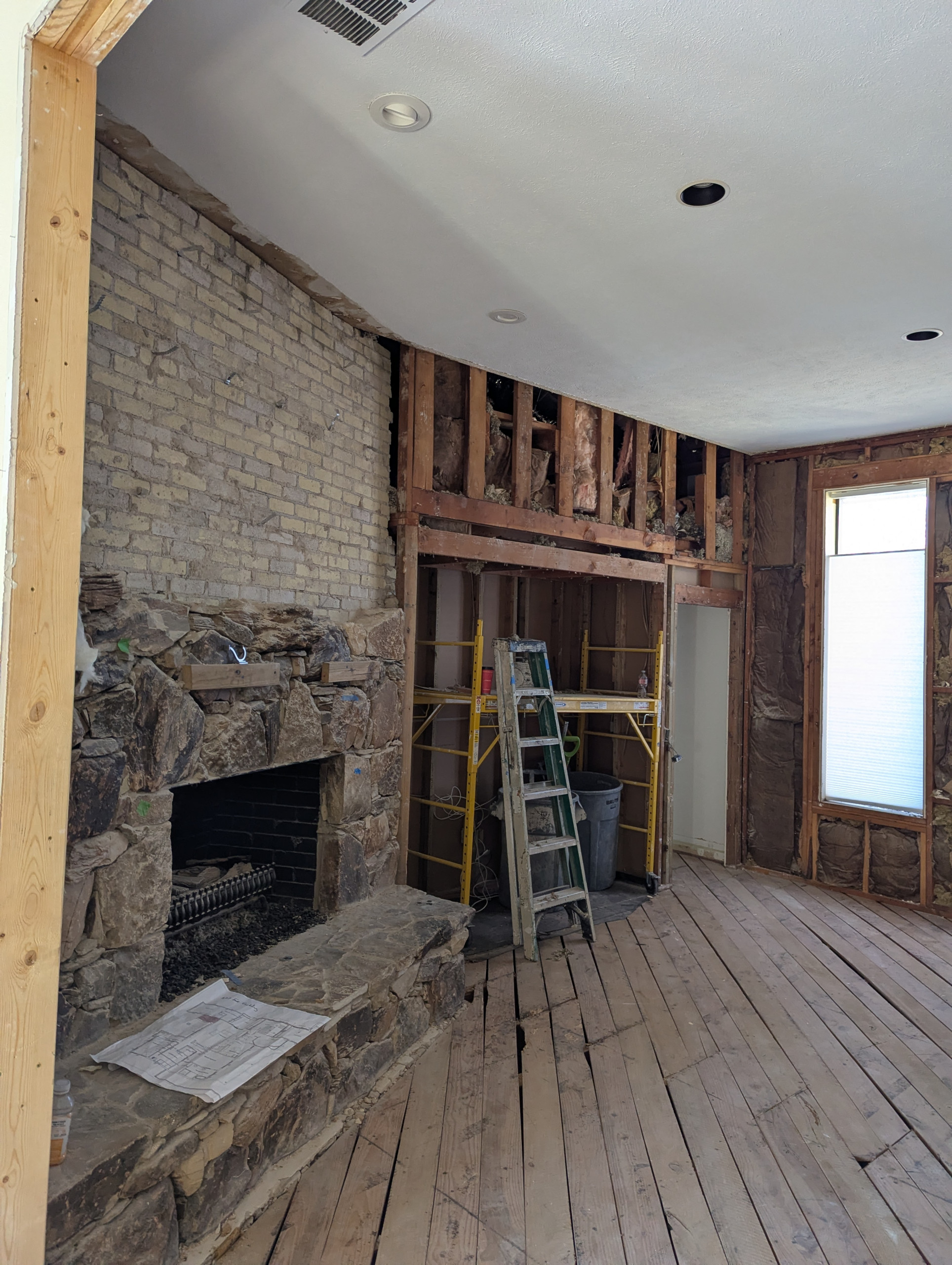 There was already some beautiful stone work done for the fireplace, watch how Eric Cantu Remodeling compliments the existing features of this home that were kept.