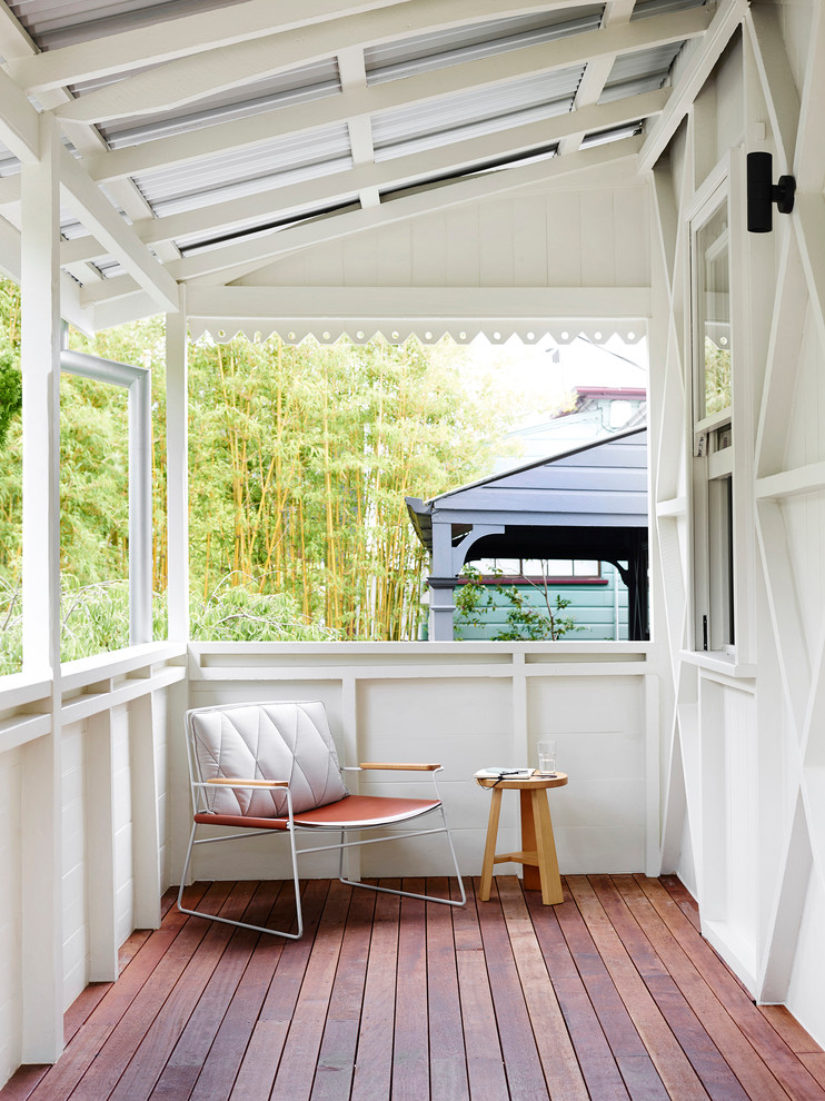 Photo of a scandinavian balcony in Brisbane with a roof extension.