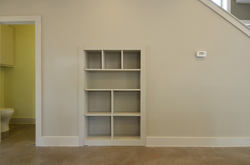 This is an example of a modern storage and wardrobe in Austin.