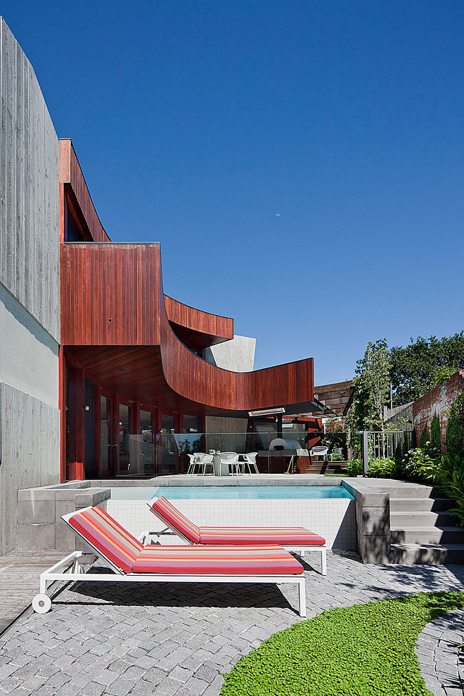 Photo of a small contemporary aboveground pool in Melbourne.