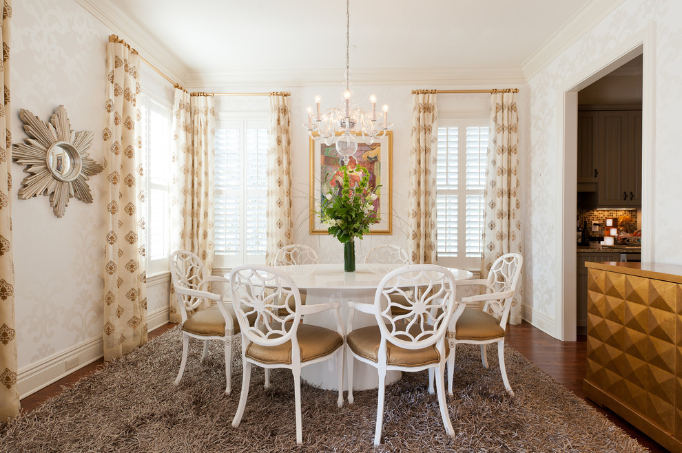 Eclectic separate dining room in DC Metro with white walls and dark hardwood floors.