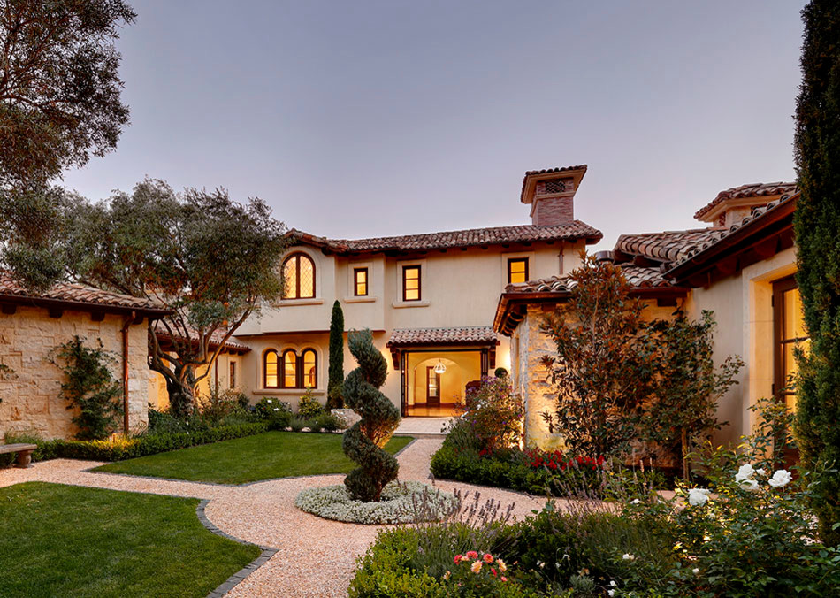 Large mediterranean three-storey beige exterior in San Francisco with stone veneer and a hip roof.