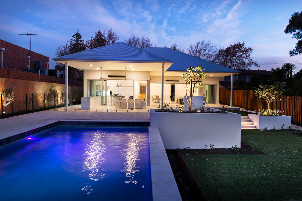 Inspiration for a large contemporary backyard rectangular aboveground pool in Perth.