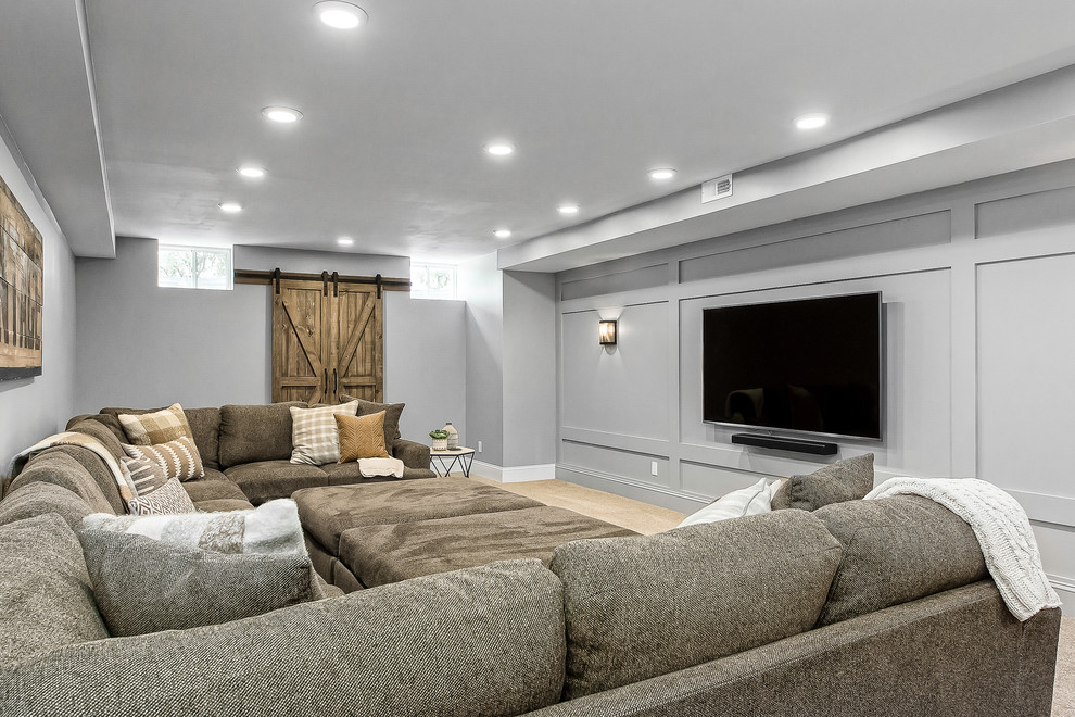 Inspiration for a large country look-out basement in Columbus with grey walls, carpet, no fireplace and beige floor.