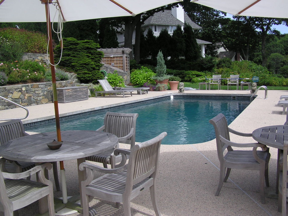 This is an example of a traditional rectangular pool in Manchester with concrete slab.