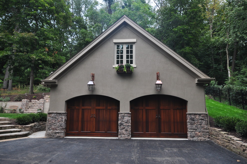 Design ideas for a large arts and crafts detached two-car garage in Other.