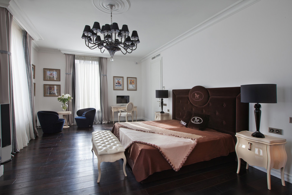Photo of an eclectic bedroom in Moscow with white walls, dark hardwood floors and no fireplace.