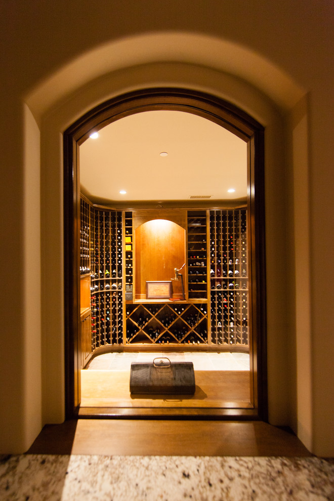 Wine cellar - large mediterranean wine cellar idea in San Luis Obispo