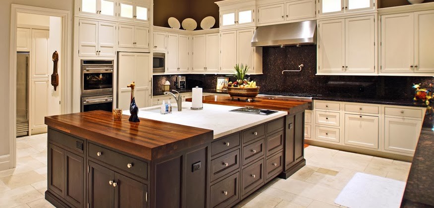 Large traditional u-shaped separate kitchen in Las Vegas with flat-panel cabinets, white cabinets, granite benchtops, black splashback, panelled appliances and with island.