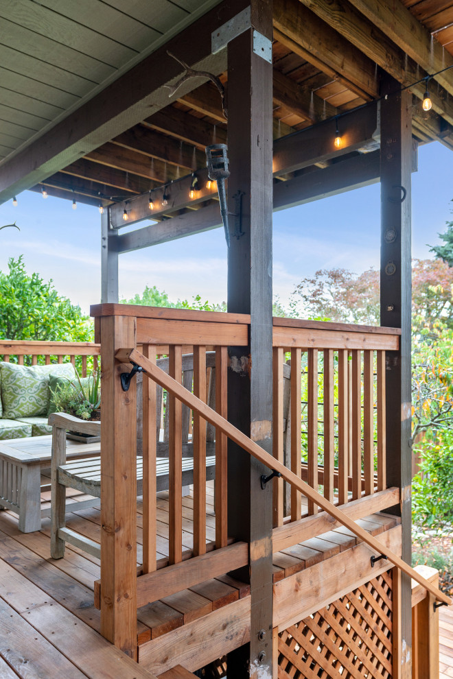Inspiration for a large rustic backyard second story wood railing deck remodel in San Francisco with no cover