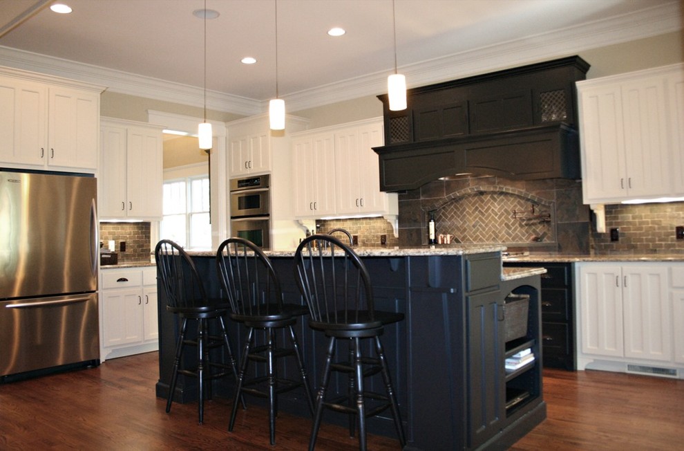 Design ideas for a country kitchen in Atlanta with stainless steel appliances.