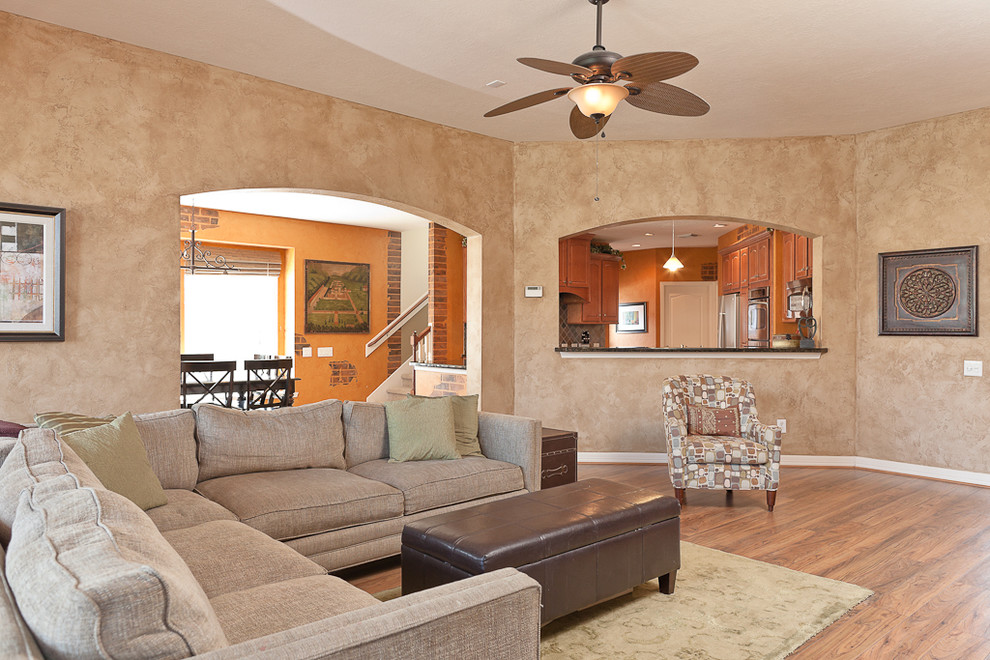 This is an example of a contemporary family room in Houston.