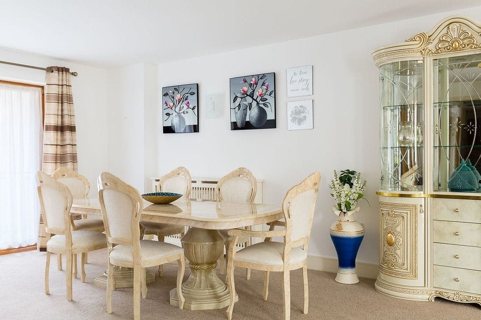 Example of a transitional dining room design in London